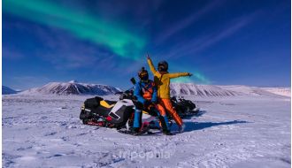 EVENING SNOWMOBILE TOUR WITH FIRE AND DINNER IN SAARISELKA