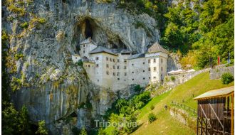 GUIDE TRIP TO POSTOJNA CAVE & PREDJAMA CASTLE FROM LJUBLJANA